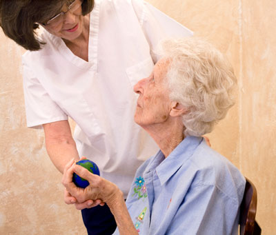 iStock_000007407022Small_Woman-with-Nurse-Pain-Management-Cropped.jpg